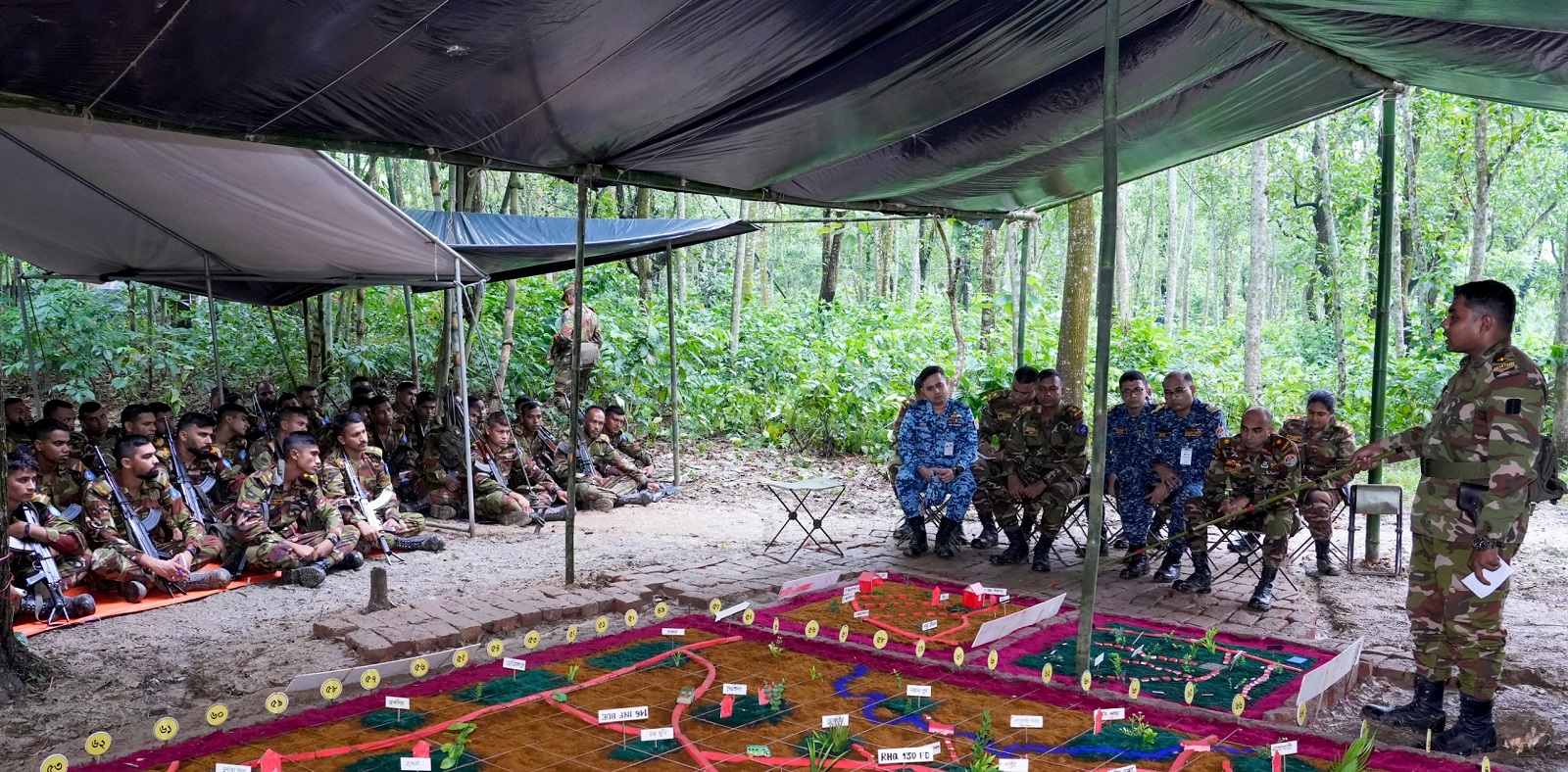 Armed Forces Division officers visiting and exchanging views with troops in Summer Training